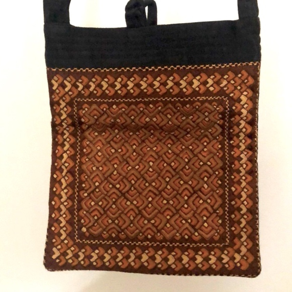 22” strap 8 1/2” L x 7” W